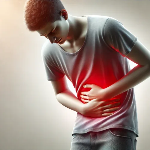 DALL·E 2025-01-29 17.16.46 – A realistic illustration of a person experiencing stomach pain. The person is holding their abdomen with a pained expression on their face. A subtle r DALL·E 2025-01-29 17.16.46 - A realistic illustration of a person experiencing stomach pain. The person is holding their abdomen with a pained expression on their face. A subtle r